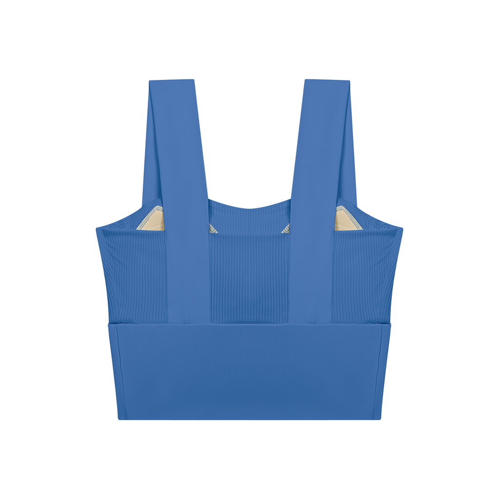 Colorful blue women’s yoga crop tank top with wide straps and ribbed textured fabric, back view