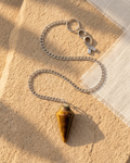 Natural tigers eye pendulum bag charm with metal chain and loop clasp