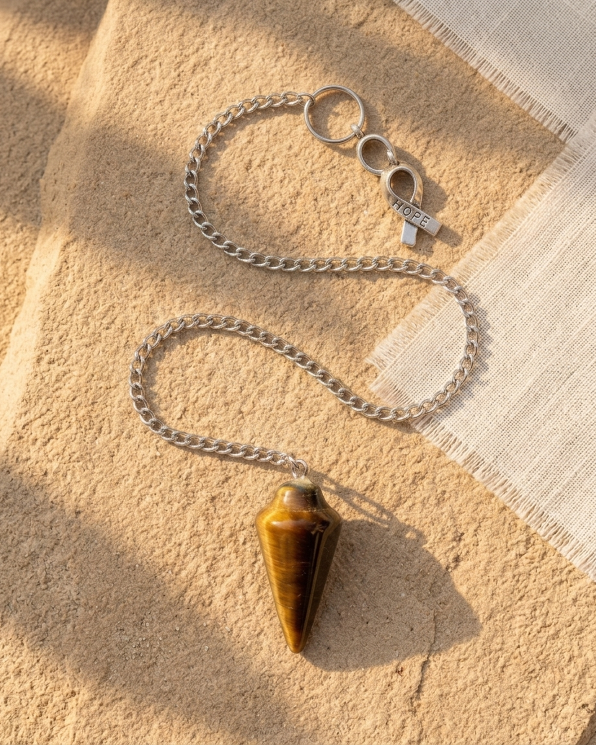Natural tigers eye pendulum bag charm with metal chain and loop clasp