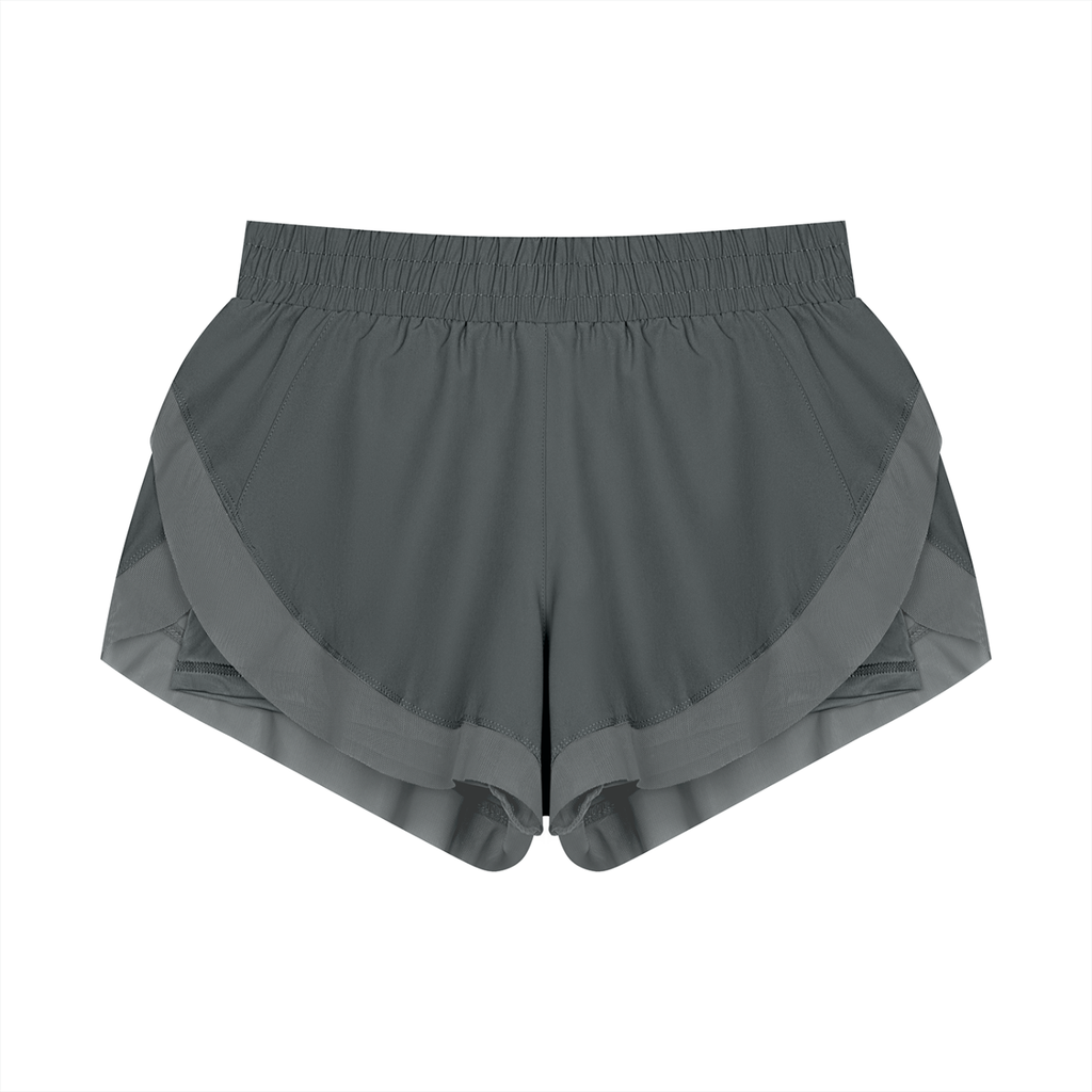 Gray paneled yoga shorts with wide elastic waistband and layered side panels.