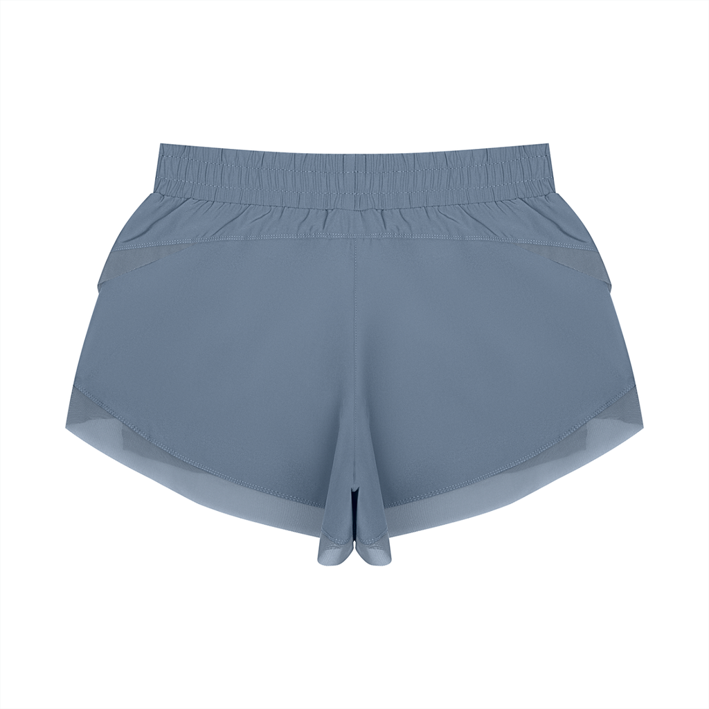 Light blue paneled yoga shorts with wide elastic waistband and layered hem detail.