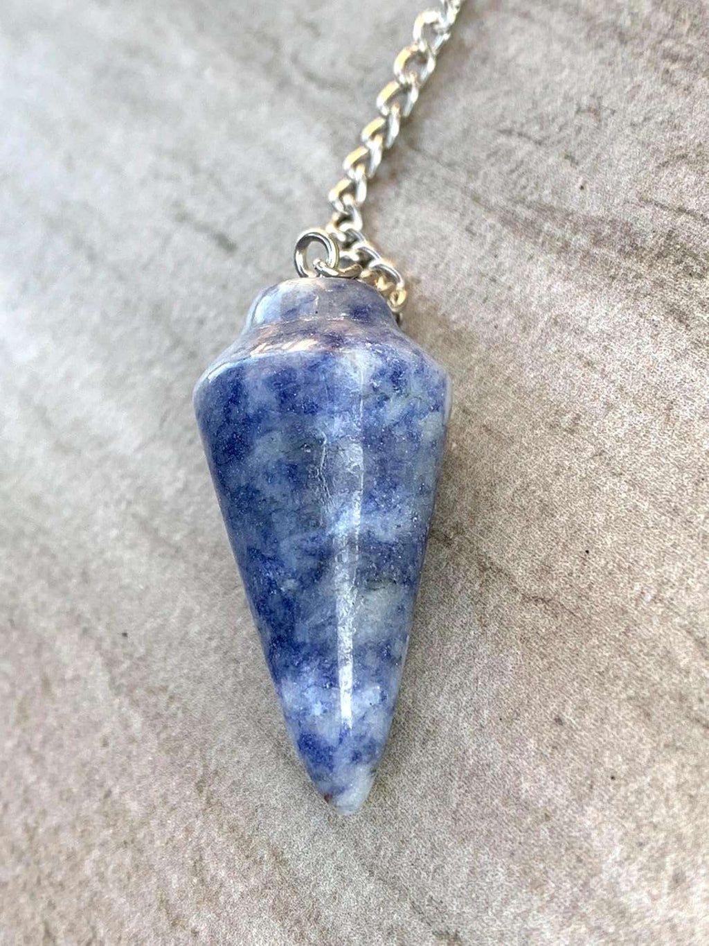 Blue gemstone pendulum bag charm with silver chain and pointed teardrop stone