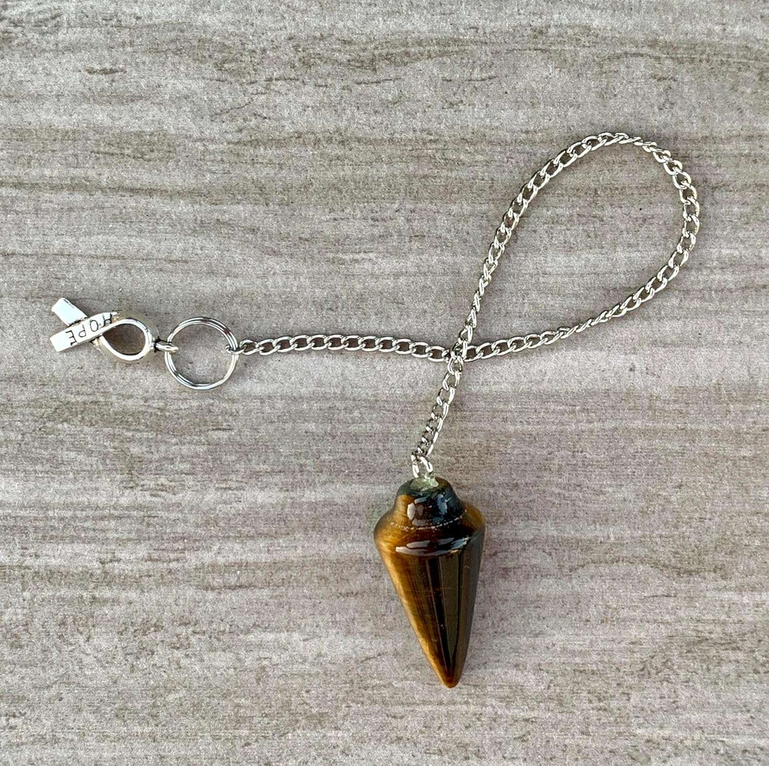 Tiger eye gemstone pendulum bag charm with silver chain and small heart tag charm