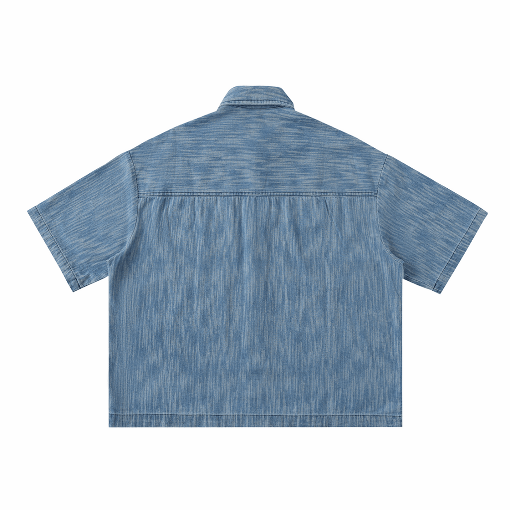 Blue distressed short-sleeve button-up shirt, back view with yoke and curved hem