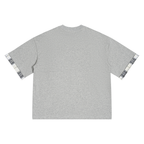 Light gray unisex T-shirt back view with plaid-cuffed sleeves