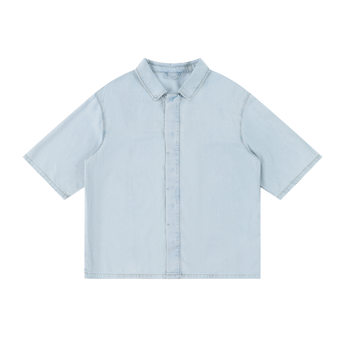 Light blue vintage-wash lyocell drop-shoulder button-up shirt with pointed collar, short sleeves.