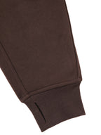 Cropped half-zip hoodie sleeve cuff in dark brown with ribbed knit finish