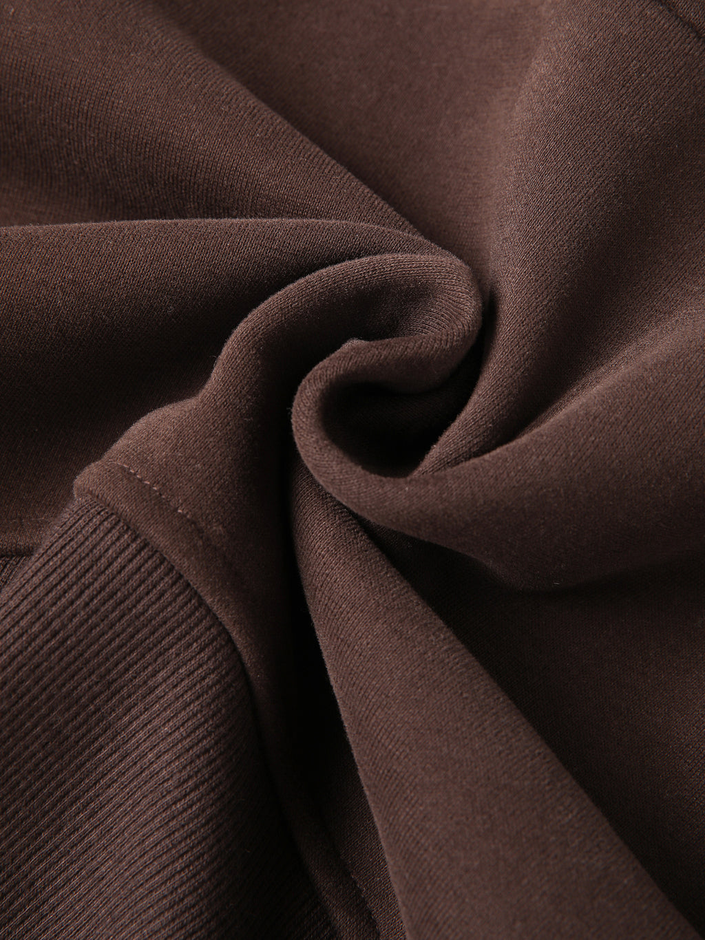 Cropped half-zip hoodie in dark brown knit with ribbed cuff detail