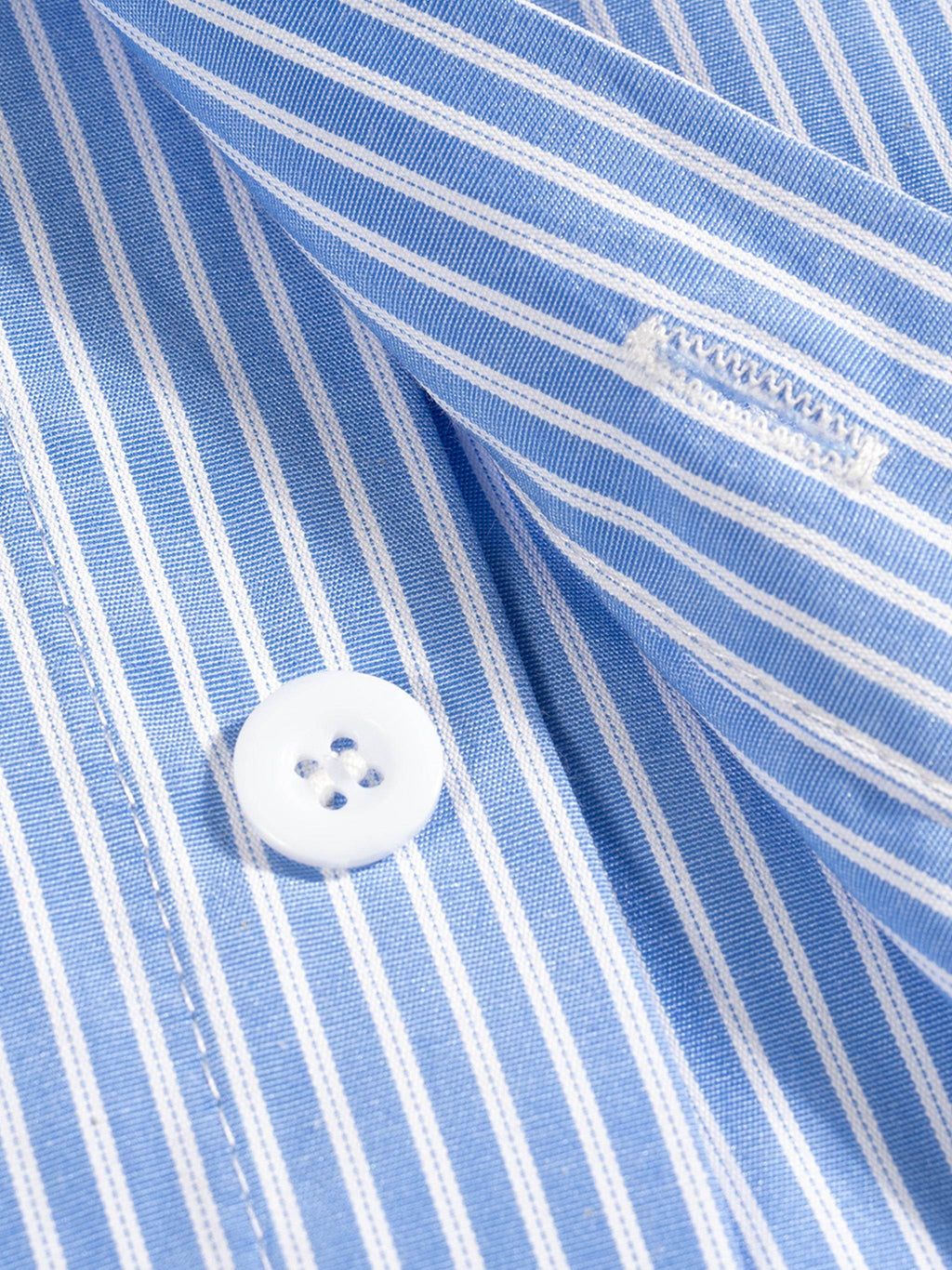 Blue vertical stripe boxy shirt with white button, partial collar visible.