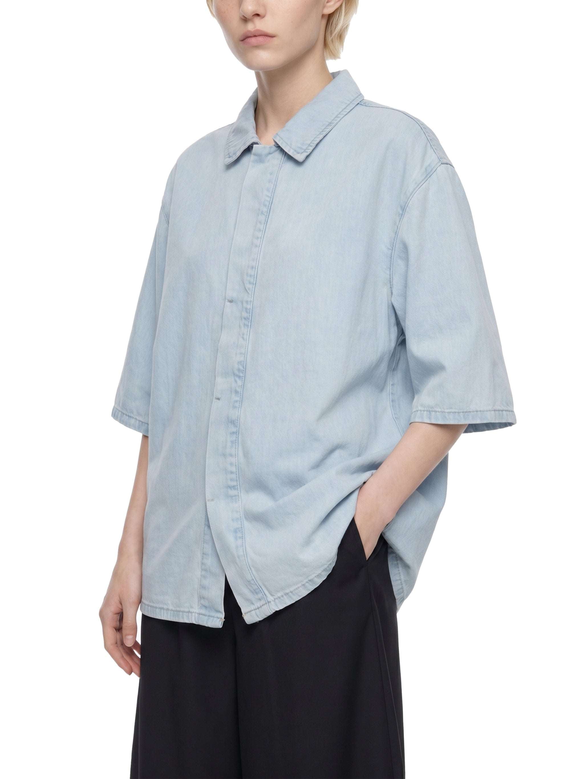 Light blue vintage-wash lyocell collared button-up shirt with drop shoulders, short sleeves
