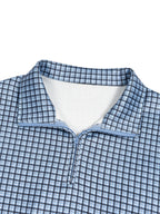 Sky blue plaid quarter-zip sweatshirt collar and zipper detail