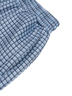 Blue plaid elastic-waist shorts with side seam and stitched hem