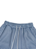 Blue plaid elastic-waist shorts with centered drawstring cords