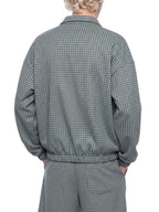 Green plaid quarter-zip sweatshirt with long sleeves and elastic hem cuffs