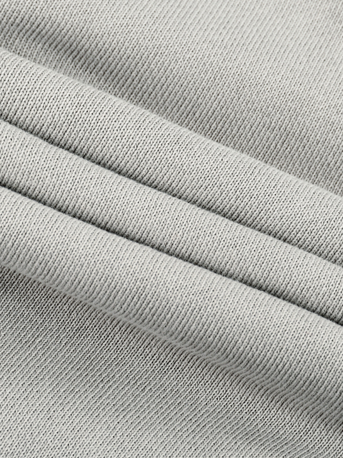 Light gray ribbed hem band with stitched seam detail
