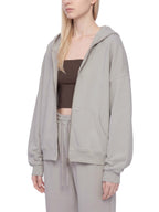 Light gray full-zip boxy hoodie with hood, kangaroo pocket, and front zipper
