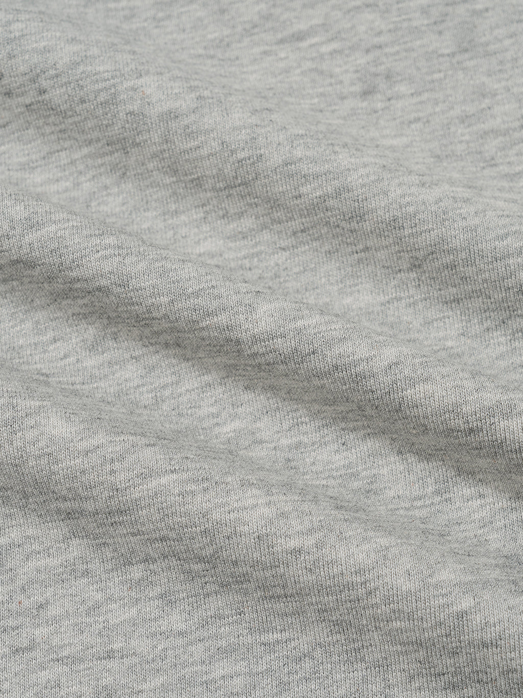 Heather gray heathered jersey T-shirt fabric close-up