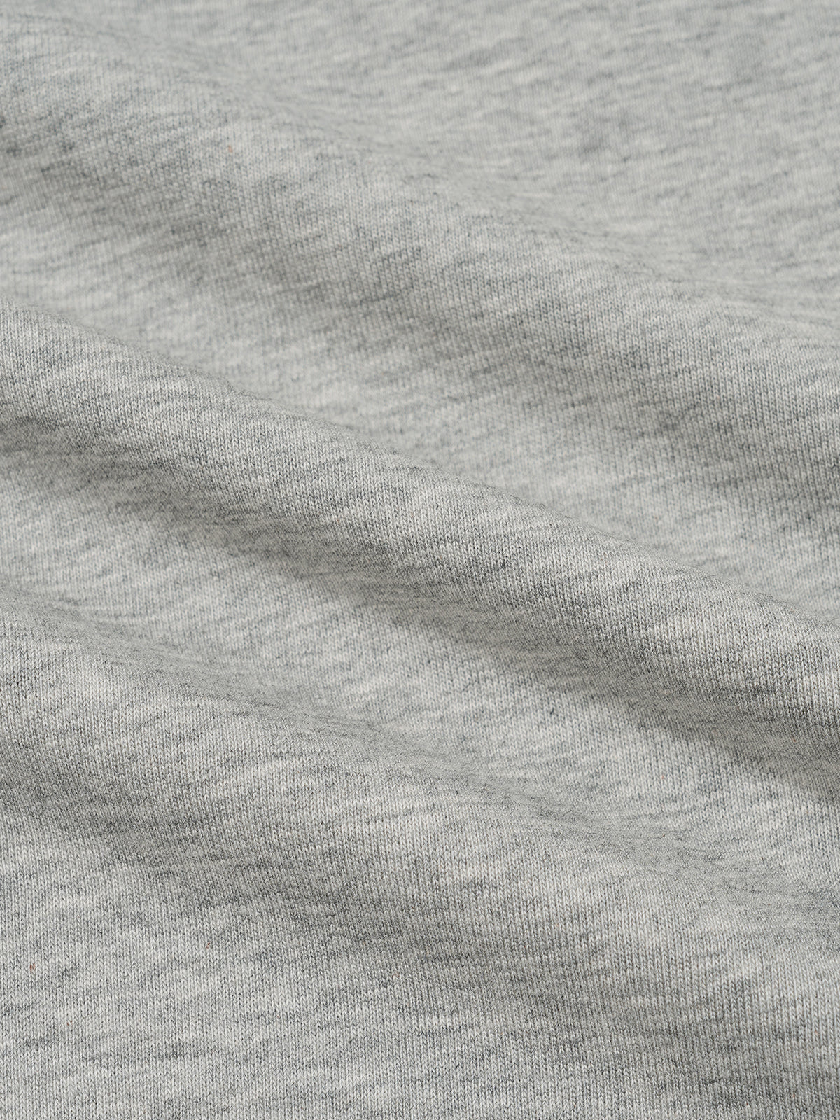 Heather gray heathered jersey T-shirt fabric close-up