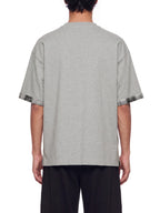 Unisex heather gray T-shirt, back view, with plaid-trim cuffs on short sleeves