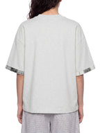 Unisex light gray T-shirt, back view, with plaid-trim cuffs on short sleeves