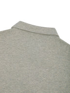 Oat gray sweatshirt with raised collar and ribbed trim at neckline