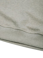 Oat gray sweatshirt hem with ribbed band and stitched edge