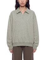 Unisex boxy quarter-zip sweatshirt, light gray, collared quarter zip, ribbed cuffs and hem