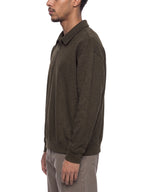 Unisex boxy quarter-zip sweatshirt, dark brown, side view, collared neckline and ribbed cuffs