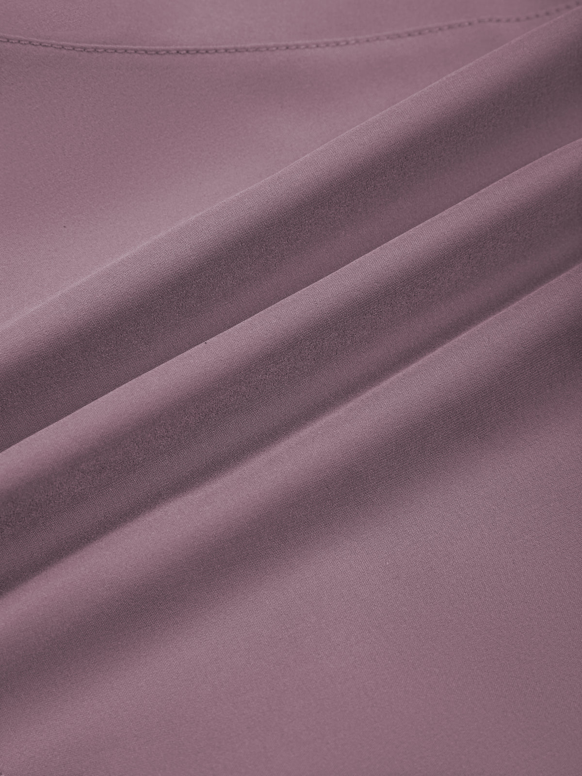 Women’s paneled yoga shorts, purple fabric close-up