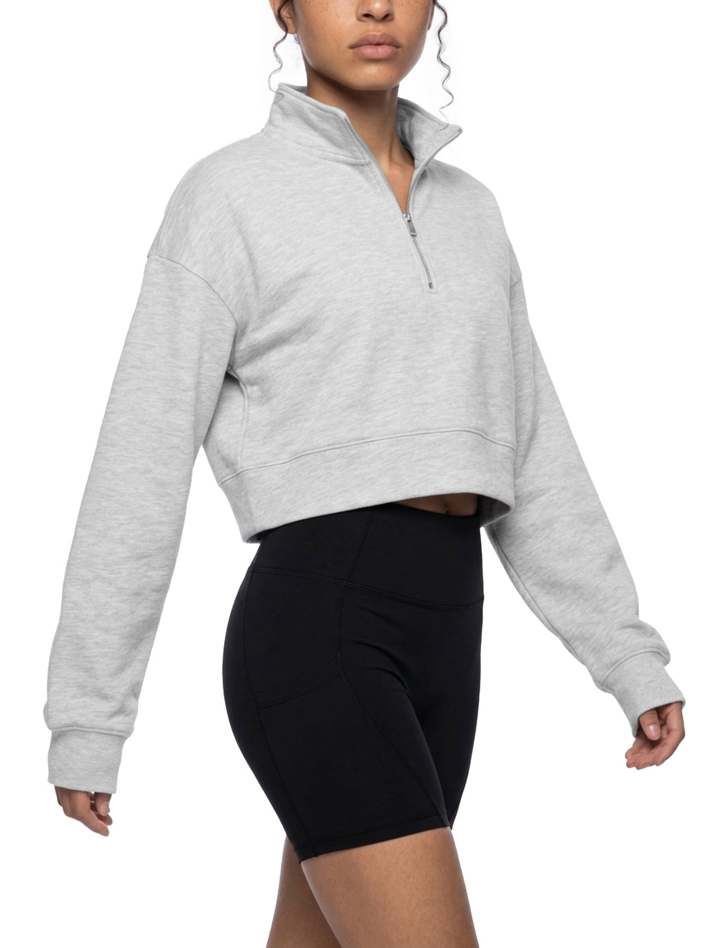 Light gray women’s crop quarter-zip sweatshirt with stand collar and long sleeves