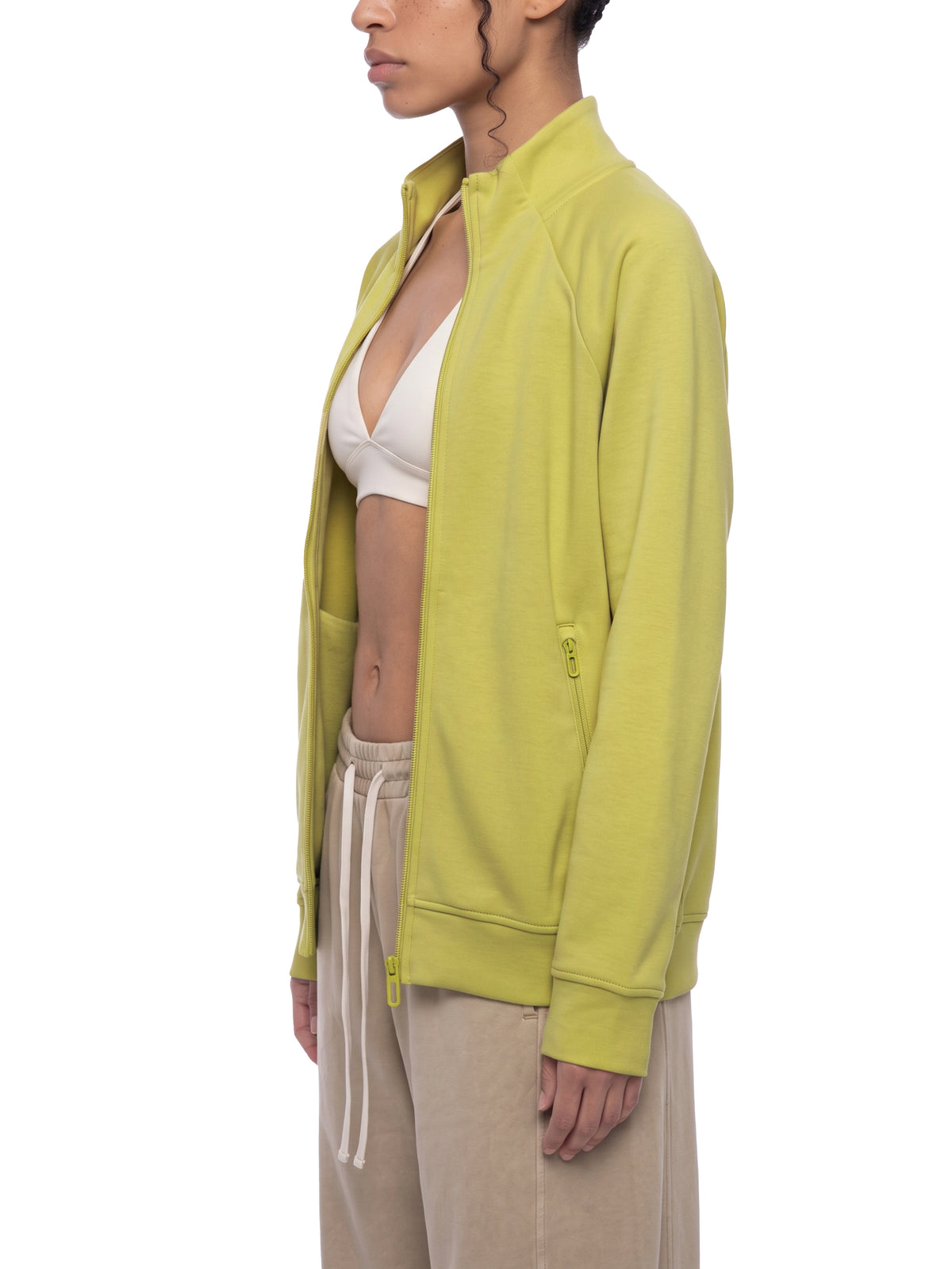 Lime yellow stand collar zip jacket, side profile with front zipper and pocket detail.