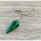 Malachite pendulum necklace with green teardrop stone and silver chain, ring clasp