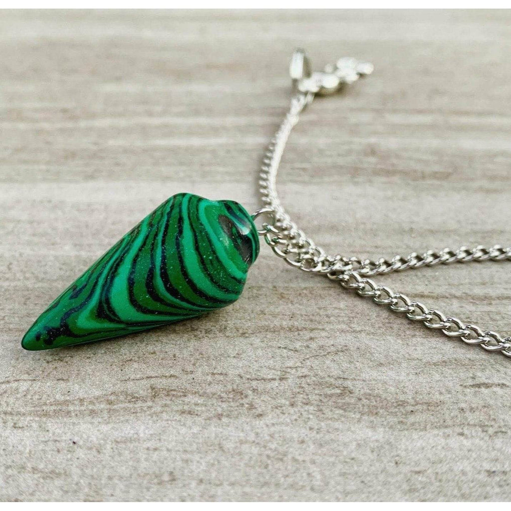 Malachite pendulum with green striped stone and silver chain, loop bail visible
