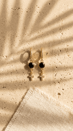Gold-tone clip hoop earrings with black zircon round and white zircon cross dangles