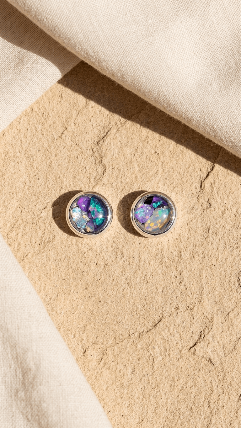 Silver opal stud earrings with round purple core and multicolor iridescence