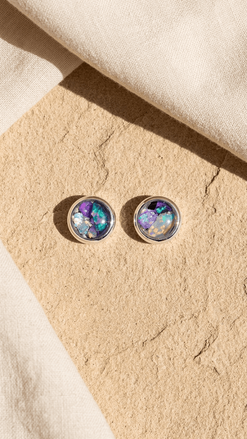 Silver opal stud earrings with round purple core and multicolor iridescence