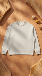 Knitted round-neck oversize sweatshirt, white with ribbed collar and cuffs, laid flat