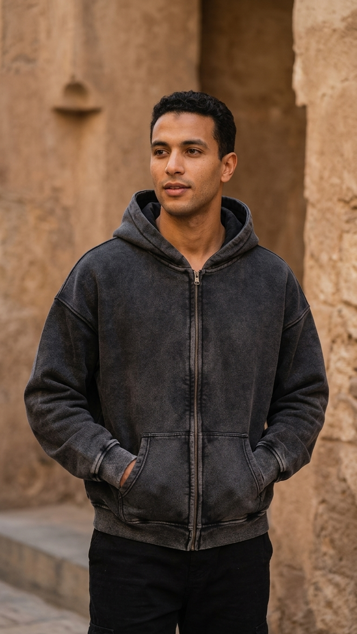 Black zip-through boxy fleece hoodie with hood and front zipper, kangaroo pockets