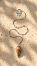 Unakite stone dowsing pendulum with long silver chain and clover connector