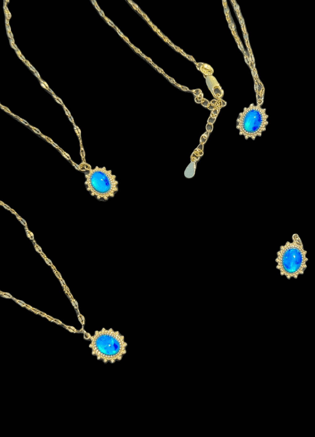 Set of gold-plated flake chain necklaces with blue cabochon opal pendants