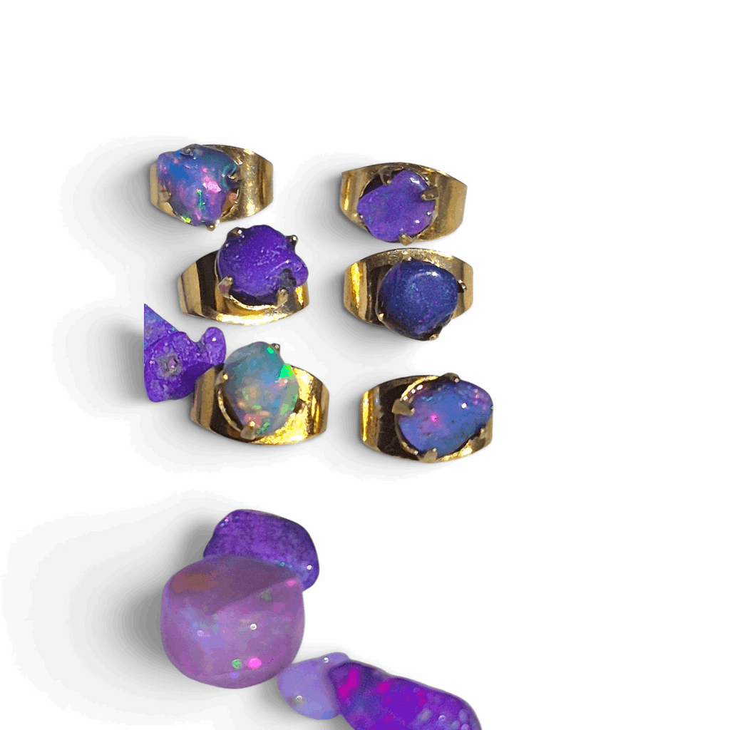 Gold opal chip stud earrings set with purple opal chips in gold bezel settings