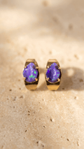 Gold opal chip stud earrings with purple opal chips in gold bezel settings
