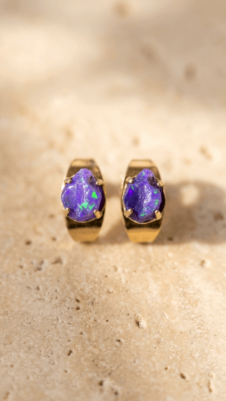 Gold opal chip stud earrings with purple opal chips in gold bezel settings